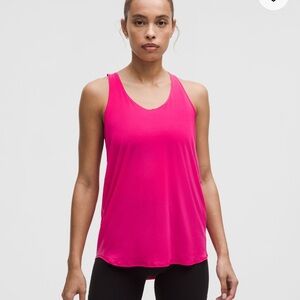 Lululemon Essentials Tank Top Pleated in color Sonic Pink size 8